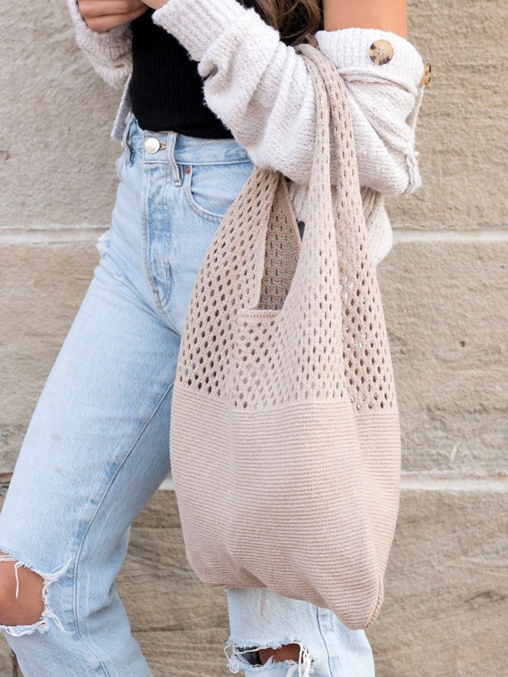 Myk strikket hobo-veske