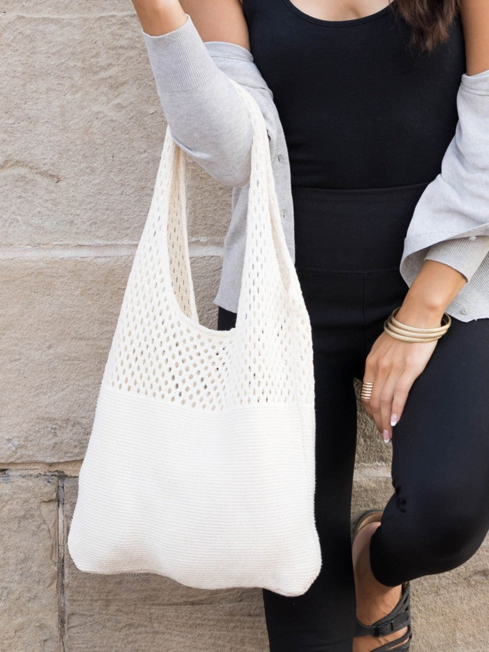 Myk strikket hobo-veske