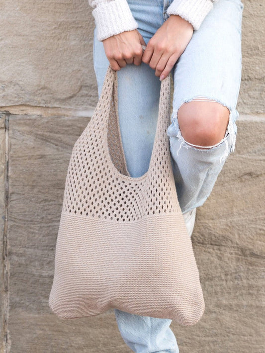Myk strikket hobo-veske